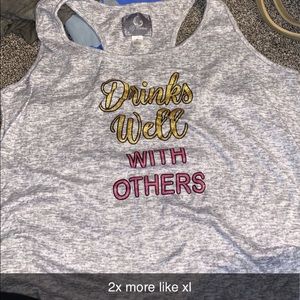 Tank top size 2x fits like XL